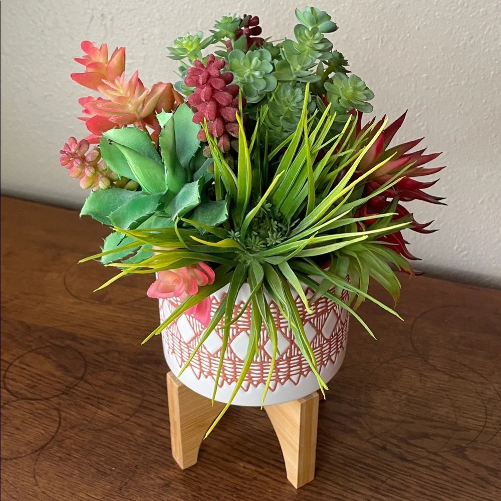 Contemporary Faux Succulent Mix in a Burnt Orange and White Ceramic Footed Vase